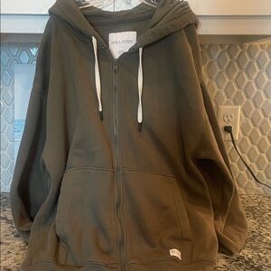 Hollister Green Hoodie with Drawstrings.     Mens size small